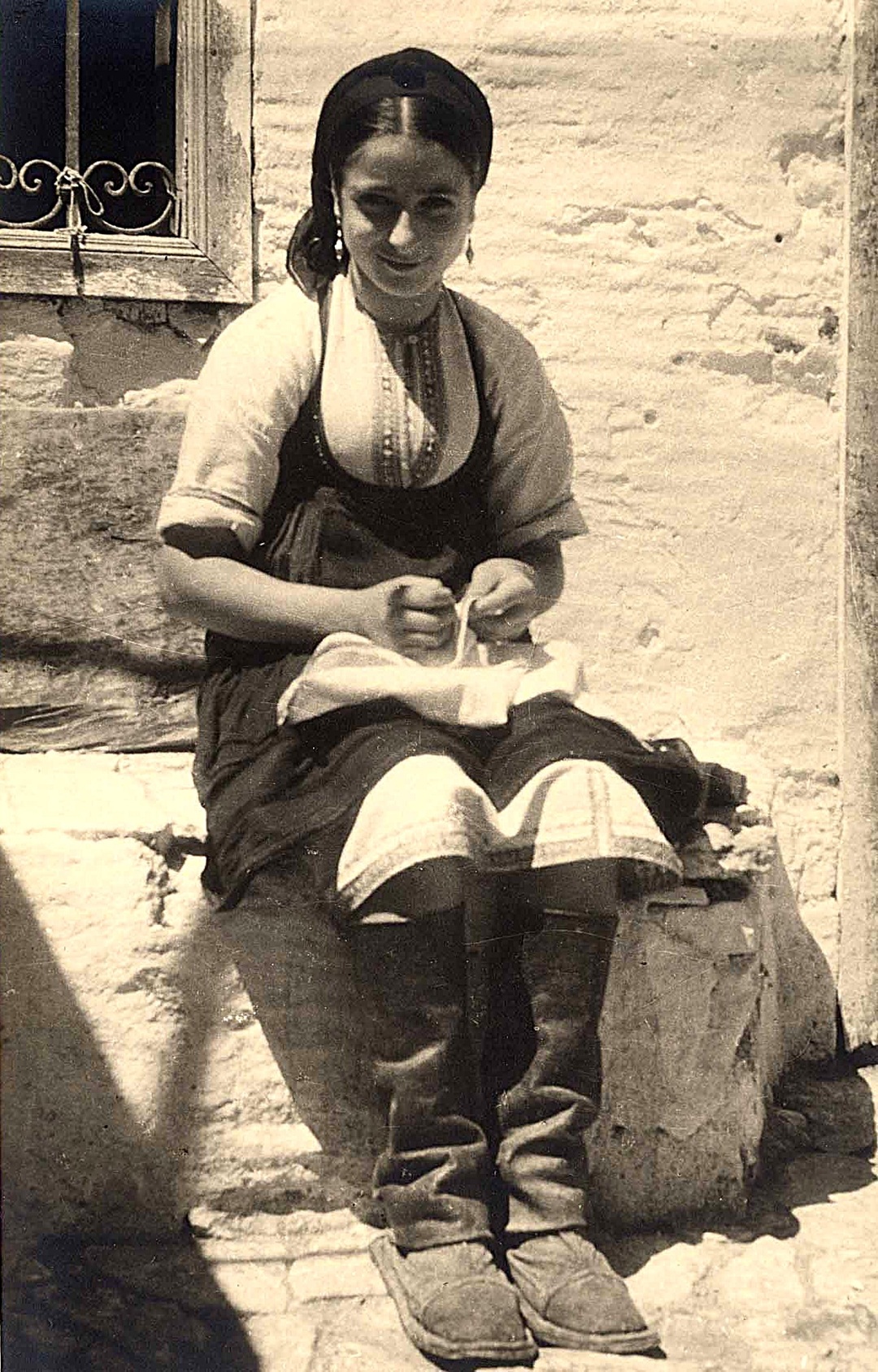 Young woman from Rhodes wearing the traditional women's costume of Emponas, 1950 artifact